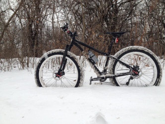 Squatch bike in snowy field